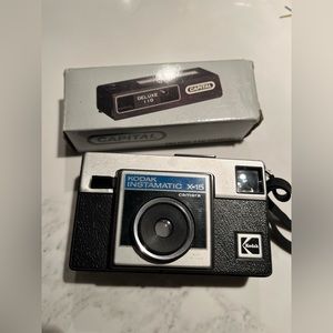 Two vintage cameras.  Capital deluxe 110 is new/unused.  Kodak instamatic x-15.